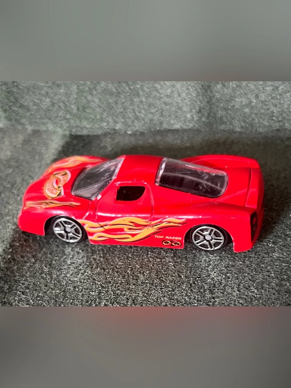 Red Assorted Brands of Die-Cast Racing Cars